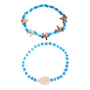 Juego de tobilleras playeras con cuentas azules y blancas y dijes de estrella de mar y caracola