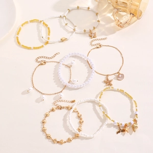 Juego de tobilleras bohemias con estrellas de mar y conchas y perlas de imitación