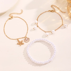Juego de tres tobilleras de playa con amuletos de estrella de mar, concha y perlas de imitación