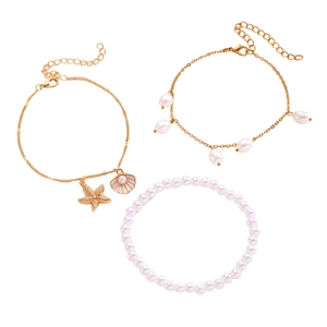 Juego de tres tobilleras de estilo playero con dijes de estrella de mar y perlas.