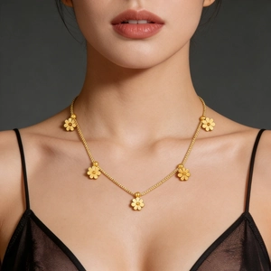 Elegant gold titanium steel daisy necklace with five flower charms on model
