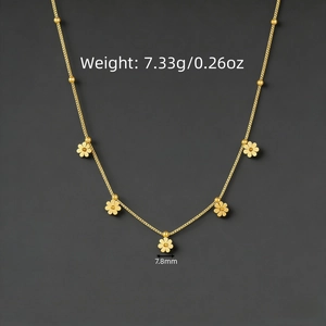 Elegant gold titanium steel necklace featuring five dainty daisy floral charms and beads