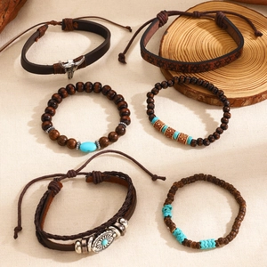 Detail of bohemian 6-piece bracelet set with turquoise beads and leather weaving