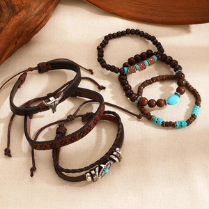 Detail of 6-piece bohemian stackable bracelets with wood beads, leather and turquoise accents