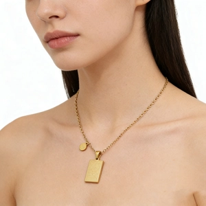 Golden square zodiac pendant necklace in 18K gold plated stainless steel on model