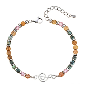 Bohemian music bracelet with natural African turquoise beads and silver treble clef pendant
