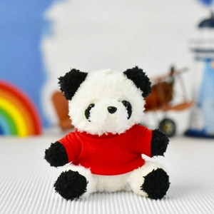 Small plush panda toy with a red shirt for keychain or bag charm decoration