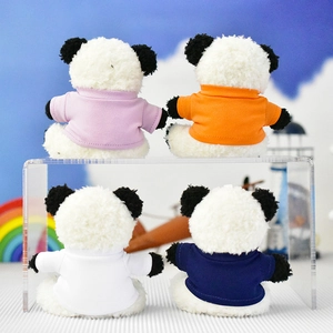 Back view of cute panda plush keychains wearing colorful miniature t-shirts