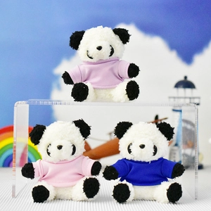 Group of cute panda plush keychain charms wearing colorful small t-shirts on display