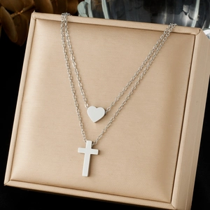 Double-layer silver stainless steel necklace featuring heart and cross pendants