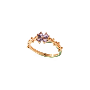 Elegante anillo de trébol de cuatro hojas chapado en oro con circonitas púrpuras y esmalte