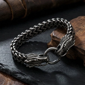 Retro dragon head woven stainless steel bracelet for men with vintage finish on rock base