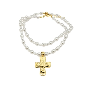 Double-strand white baroque pearl necklace with a textured gold cross pendant for women