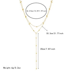 Detail view of gold double layer beaded necklace showing exact chain lengths and pendant size