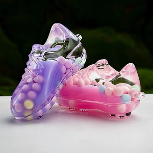 Macro detail of acrylic sneaker keychains featuring colorful macaron beads and resin texture