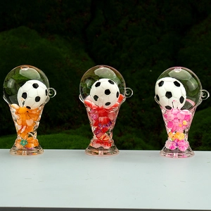 Acrylic trophy liquid sand keychain with mini soccer ball in orange red and pink