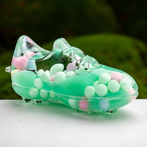 Close-up of sneaker-shaped liquid keychain with colorful macaron beads and fluid