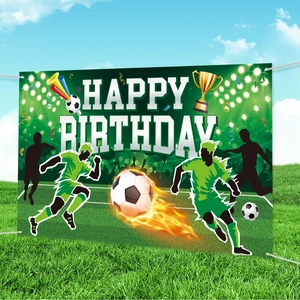 Soccer theme happy birthday banner with green grass pitch, golden trophy and flaming ball