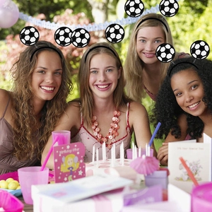 Glitter soccer ball headbands worn by four people for World Cup fan celebrations and parties