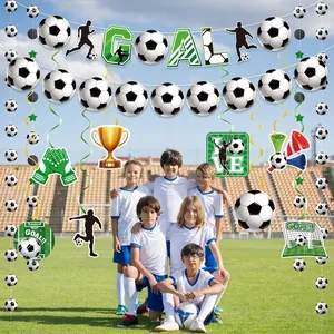 Soccer theme party set with GOAL banner, football swirls, and stadium background decorations