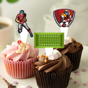Detail of football cupcake toppers showing players and field designs on a creamy cake
