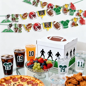 Detailed view of American football party decorations including banners and stickers