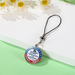 Detail of USA 250th Anniversary keychain with Statue of Liberty and red white blue enamel