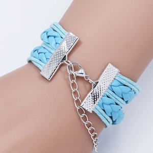 Detail of light blue multilayer woven bracelet with silver adjustable lobster clasp