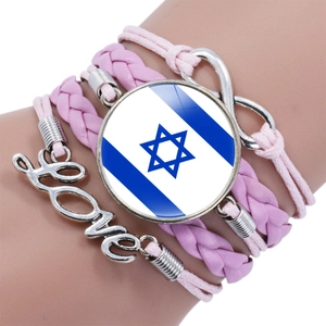 Detail of pink layered bracelet featuring Israel flag charm, love text and infinity symbol