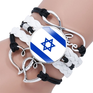 Detail of multi-layer woven bracelet with Israel flag cabochon and silver Love charm