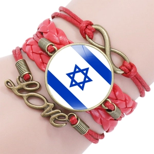 Detail of red multilayer woven bracelet with Israel flag cabochon and love charm