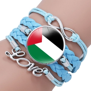Close-up of sky blue multilayer bracelet with Palestine flag gem and Love charm