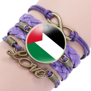Detail of Palestine flag glass gem on purple leather multi-layer infinity love bracelet