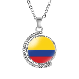 Detailed rotating moon alloy necklace featuring Colombia flag glass cabochon charm