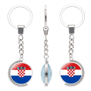 Rotating silver keychain featuring the Croatia flag and coat of arms under glass