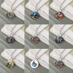 Silver American flag and eagle glass cabochon pendant necklaces shown in a 3x3 grid display