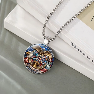 Macro detail of 250th anniversary pendant featuring US flag and eagle with silver chain