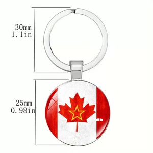 Macro view of Canada maple leaf flag keychain pendant with dimension markers