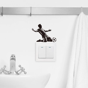 Waterproof soccer player silhouette wall sticker applied above a modern light switch