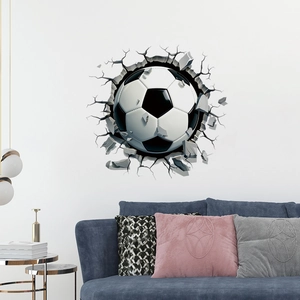 3D sports wall sticker showing a soccer ball breaking through a white living room wall