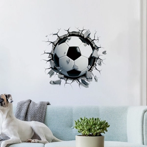 3D football wall sticker with broken wall effect above a modern living room sofa