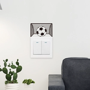 Detailed view of waterproof football goal switch sticker on a white wall panel