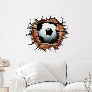 3D wall sticker featuring a realistic soccer ball breaking through a brick wall for home decor