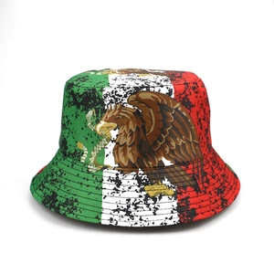 Detailed texture of Mexico flag bucket hat featuring artistic eagle graphic and cotton fabric
