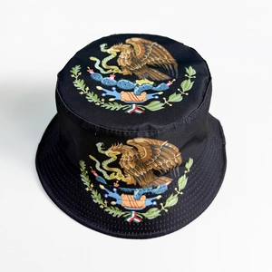 Close-up of Mexico national emblem print on black canvas sun hat for soccer fans