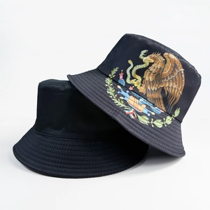 Two-piece reversible Mexico bucket hat set in black with eagle flag print and solid color