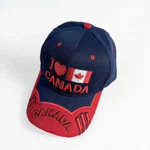 Detailed embroidery of I Love Canada and maple leaf flag on navy cotton baseball cap