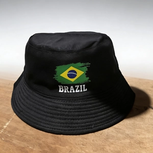 Close-up of printed Brazil flag and white text on a black cotton bucket hat