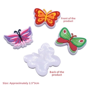 Detailed view of colorful butterfly PVC patches showing front and back texture 2.5x3cm