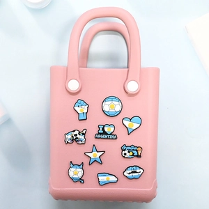 Pink EVA tote bag with custom Argentina soccer themed PVC charms and football badges
